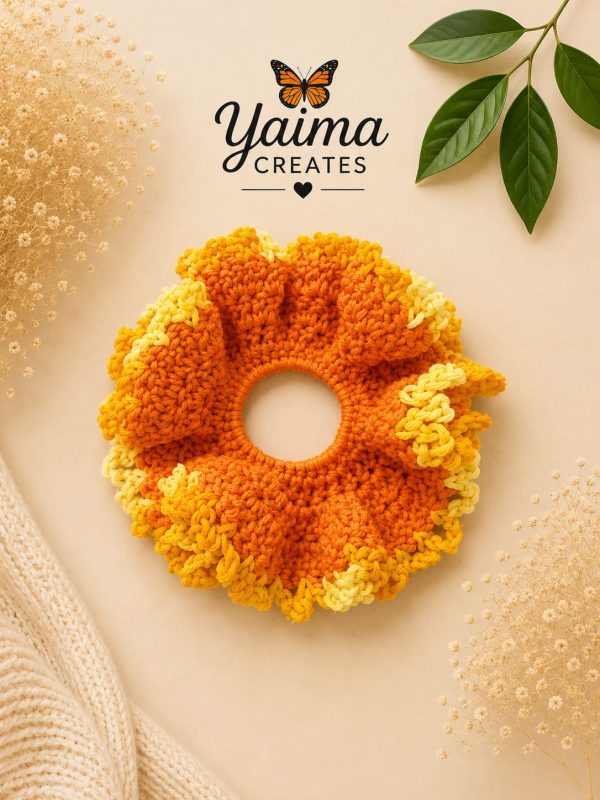 Amanecer – stor orange och gul handvirkad scrunchie